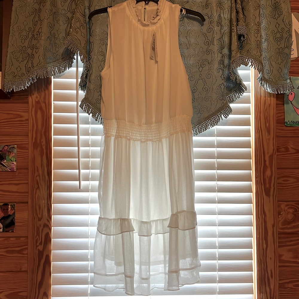 NWT gorgeous white dress! Bought as gift, but it’s the wrong size.